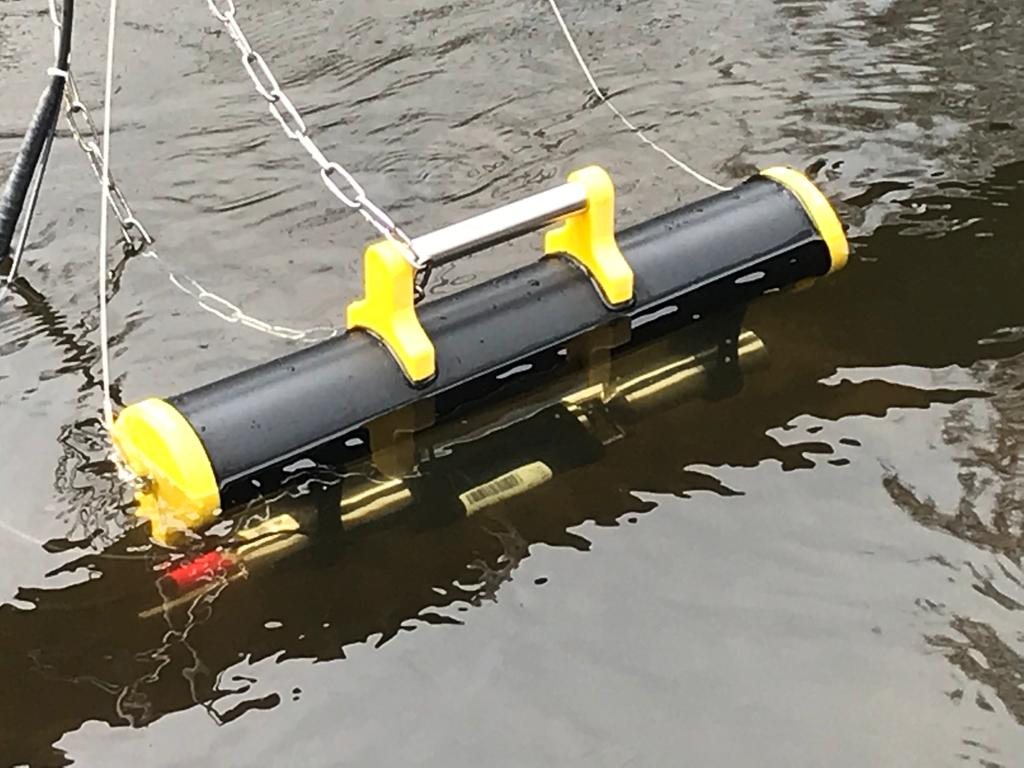 Optical nitrate probe in a yellow and black float at the water surface